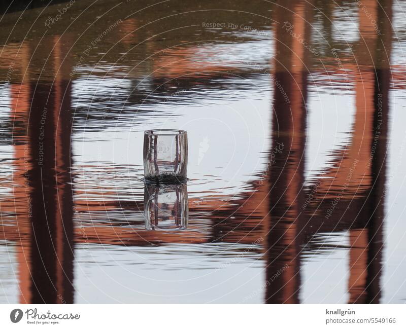 Empty drinking glass standing in shallow water Water Industrial plant Steel Industry Industrial architecture Reflection Surface of water Industrial heritage