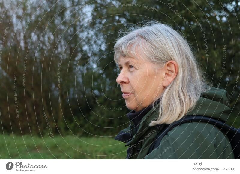 Wide country | senior woman in half profile looks into the distance Woman Senior citizen Human being portrait feminine Feminine Long-haired Gray-haired Adults