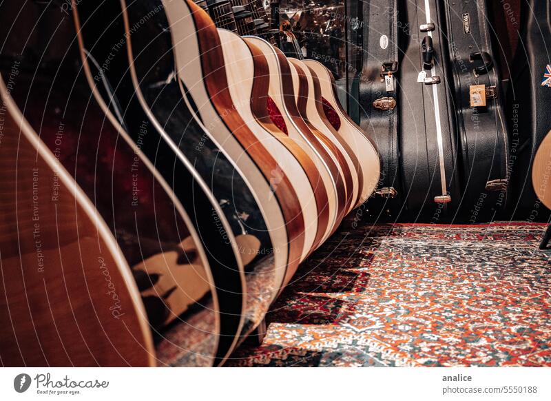 Series of guitars Guitar Guitar case Music Musical instrument Carpet wooden Concert shop