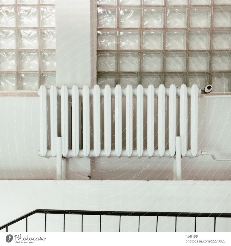 Old solid steel radiator in a stairwell Heater heating costs Heating Warmth Energy Winter Save energy Temperature Energy crisis Cold Flat (apartment) warm