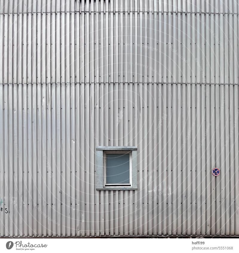 Corrugated sheet metal exterior façade with window and no stopping sign Corrugated iron wall corrugated sheet metal facade No standing minimalism Minimalistic
