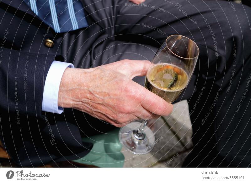 Hand of old man holding champagne glass Man Old Glass Champagne glass Drinking Triker Alcoholics alcoholism Alcoholic drinks Party Feasts & Celebrations Vine