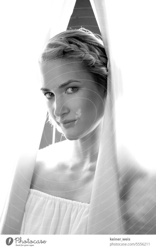 Curtain up on the radiant feminine beauty of a woman in a black and white photo Woman Beauty & Beauty black-and-white Black & white photo Face Head Drape