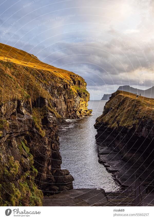 Crevice near the village Gjógv on the Faroe Island Eysturoy färöer coast Ocean atlantic ocean Fissure Canyon Northeast Atlantic Atlantic coast Denmark mountain