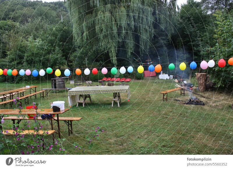 End of a garden party - empty beer tables and a string of balloons Garden festival forsake sb./sth. Deserted Feasts & Celebrations Party