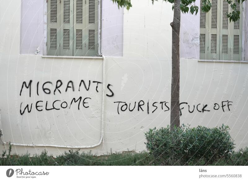 MIGRANTS WELCOME - TOURIST'S FUCK OFF Migrants Tourist Tourism welcome Migrants welcome Characters Graffiti Facade Deserted Refugee Welcome Remark