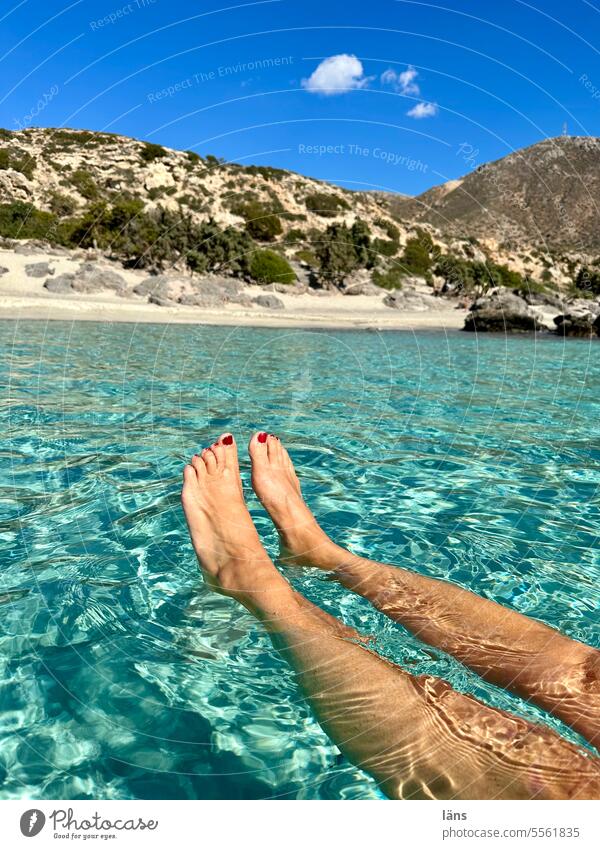 Woman drifting relaxed in the sea Legs Ocean Mediterranean sea Crete Greece Vacation & Travel Water coast Landscape Beach Nature Idyll Tourism Relaxation