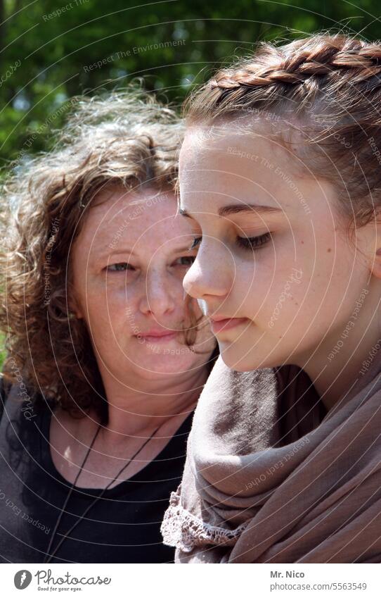 face to face Side by side Looking away Trust Happy Pride Together Face to face Mother Daughter Family & Relations Mother and daughter portrait