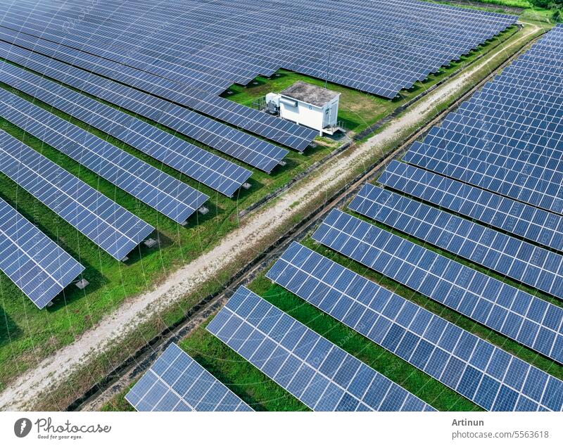 Aerial view of solar farm. Solar power for green energy. Sustainable resources. Solar cell panels use sun light as a source to generate electricity. Photovoltaics or PV. Sustainable renewable energy.