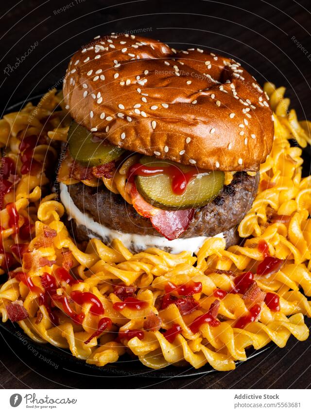 Hamburger with macaroni and cheese hamburger gourmet bun sauce meat plate serve food meal delicious tasty lunch cuisine dish dinner snack nutrition cook bread