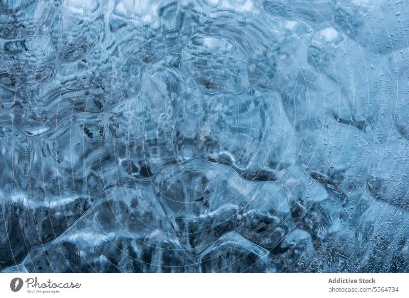 Close up of piece of ice frost cold water frozen glacier iceland seaside seashore north freeze beach nordic Jokulsarlon close up iceberg ice diamond crystal