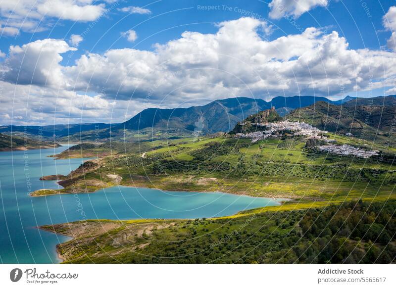 Picturesque view of village against mountain valley and lake in Zahara de la Sierra in Spain range scenery landscape environment nature settlement water river