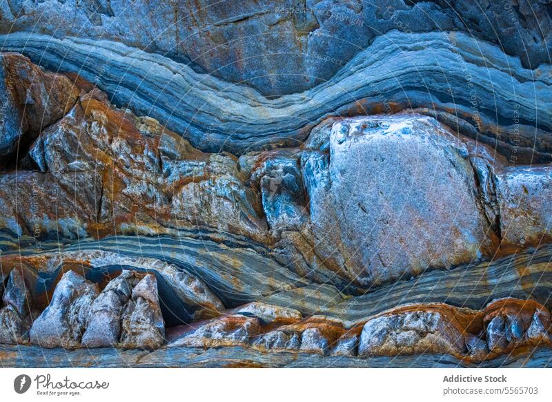 A background of blue rocks texture grey natural costa asturias coastal nature landscape art artwork scenery sea ocean waves beach rocky serene tranquil peaceful