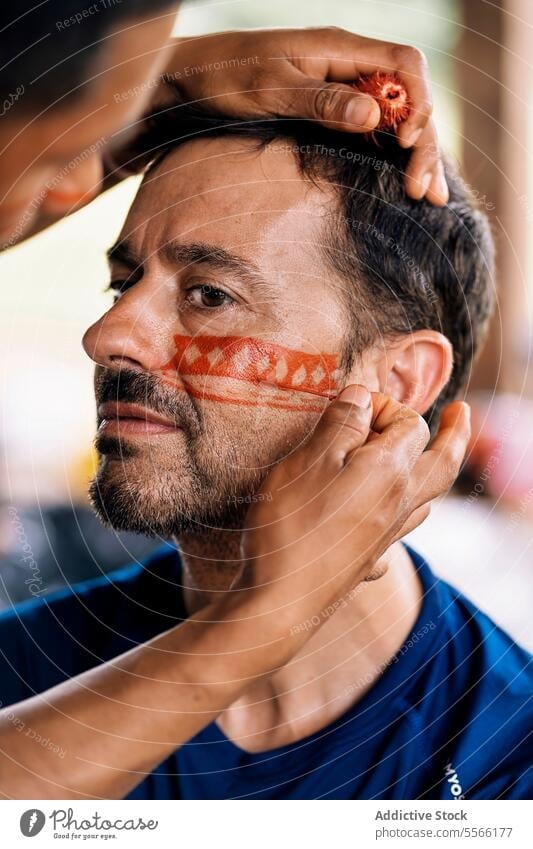 Bearded man painting on face tradition art middle age casual mature style culture perfect decor headshot hairstyle facial traditional relax human face pleasure