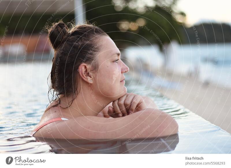 THOUGHTFUL - VACATION - RELAXATION Woman 30 - 40 years Chignon Infinity Pool Ocean Beach vacation Vacation mood Tourism tourist pool Water bathe Relaxation