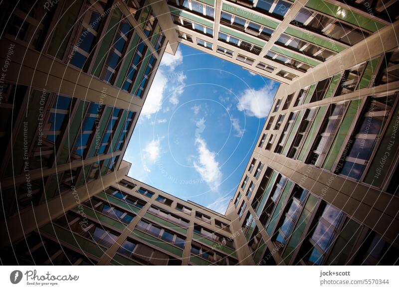 Courtyard of modernity Backyard Modern architecture Facade Wide angle Symmetry Well of light Sky Shadow Worm's-eye view Sunlight Building Clouds rectangular