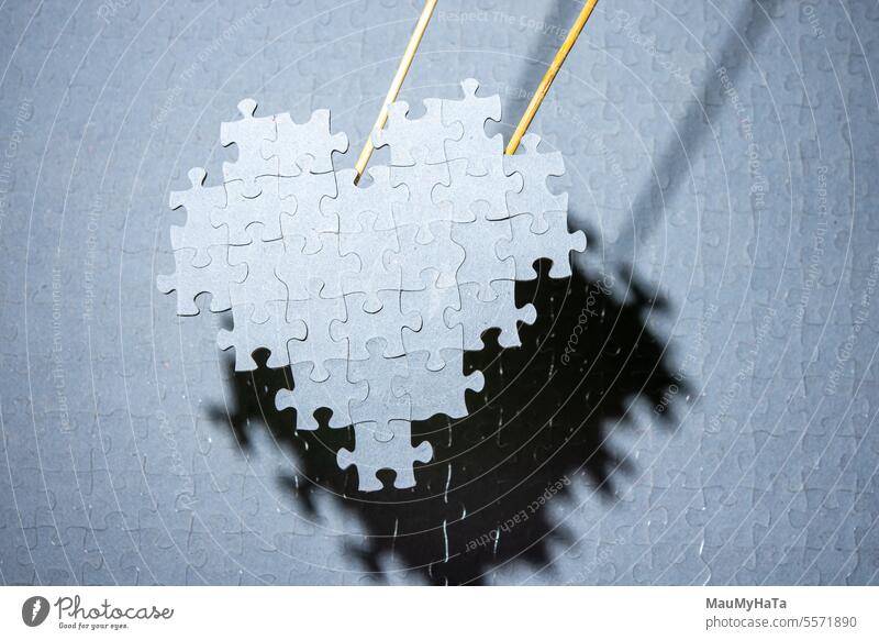 a heart made of puzzle pieces Puzzle pieces peaces Heart Playing Intellect Colour photo strategy Competition