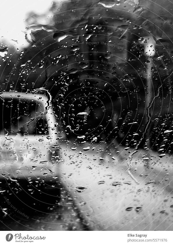 View of the road through the windshield in the rain... Car window car raindrops Drops of water Bad weather Weather Rainy weather Autumn Detail Damp Gray Wet