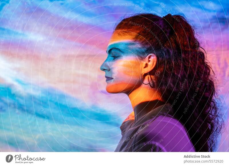 Serene woman amidst a canvas of spirituality and well-being color serenity mental swirl aura peace balance meditation connection visual harmony reflection