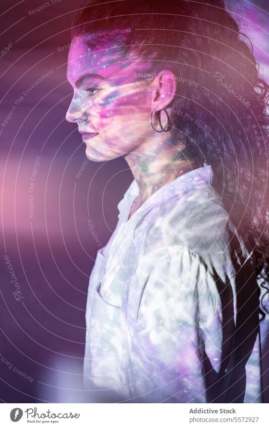 Ethereal woman with painted face in spiritual illumination portrait ethereal mental serenity light profile individual cosmic art color emotion tranquility
