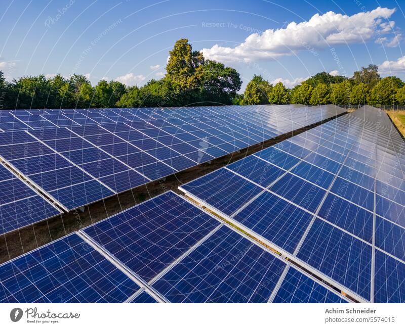 Close-up of solar modules from a solar park with the drone details Solar panels Area Environment Aerial photograph Agribusiness plant tree Germany