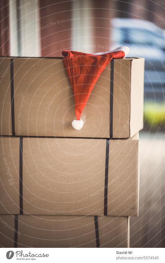 https://www.photocase.com/photos/5574545-christmas-mail-parcels-from-the-letter-carrier-slash-santa-claus-for-christmas-photocase-stock-photo-large.jpeg