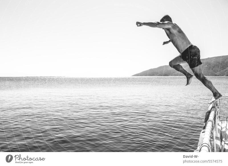 Man jumps into the sea Jump courageous Athletic Athlete athletic Water Ocean ocean Vacation & Travel Adventure Freedom muscle Art Artistic