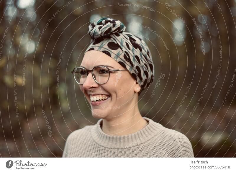 LAUGHING WOMAN - HAPPY Woman 18 - 30 years Eyeglasses Headscarf Laughter fortunate pretty Nose ring Adults Colour photo Exterior shot Feminine Joy Young woman