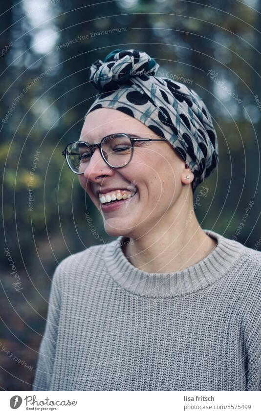 JOIE DE VIVRE - LAUGHTER - BEAUTY Woman 18 - 30 years Eyeglasses pretty Laughter Headwear Headscarf Autumn Forest Nature Closed eyes Adults Colour photo