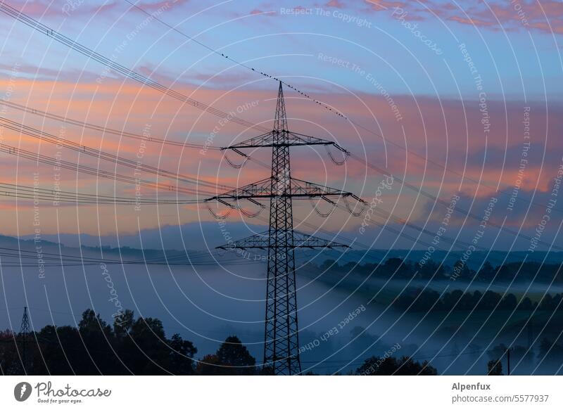 Tense in the morning high-voltage cables transmission lines Energized Environmental protection Tension power line Climate change lattice mast energy revolution