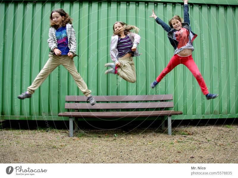 flying circus Body tension Jump Joy fun Hop jumping Joie de vivre (Vitality) Playing Legs apart Weightlessness Dynamics Movement activity Bench jump up bench