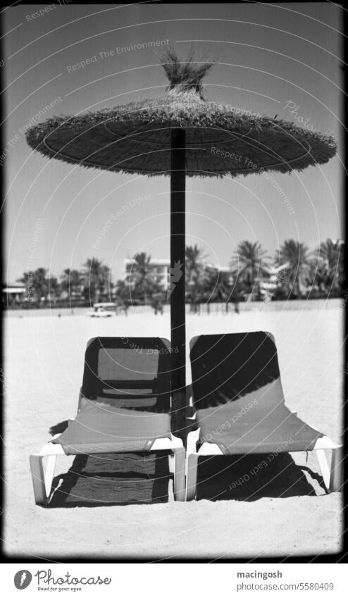 Sun protection on the beach in Fuerteventura Black & white photo Analog analogue photography black-and-white Black and white photography Exterior shot Deserted