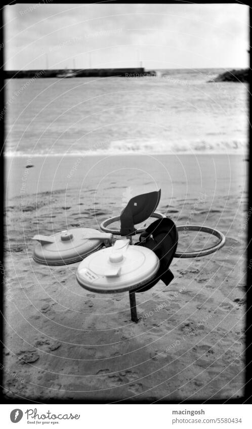 Waste collection point on the beach in Madeira Black & white photo Sadness Transience Analog analogue photography black-and-white Black and white photography