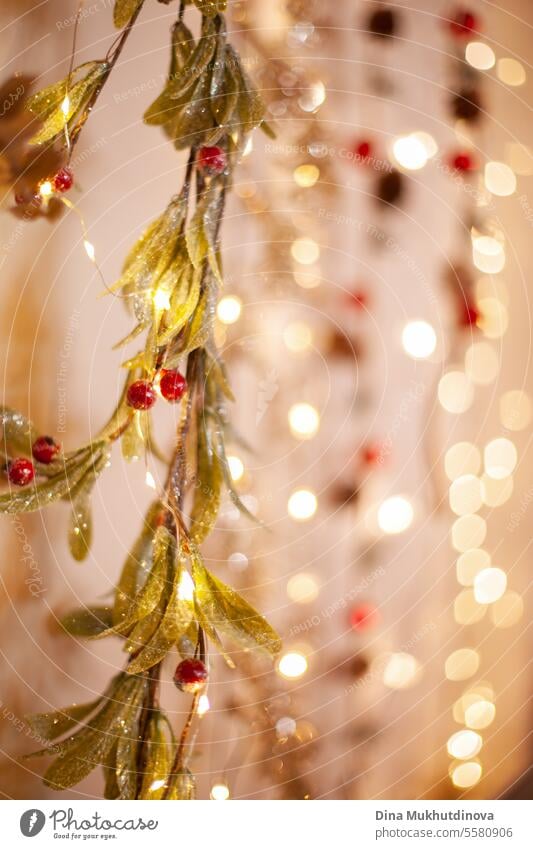 Christmas garlands at market. Holiday season decoration lights bokeh. christmas advent Christmas & Advent Fairy lights Christmas fairy lights