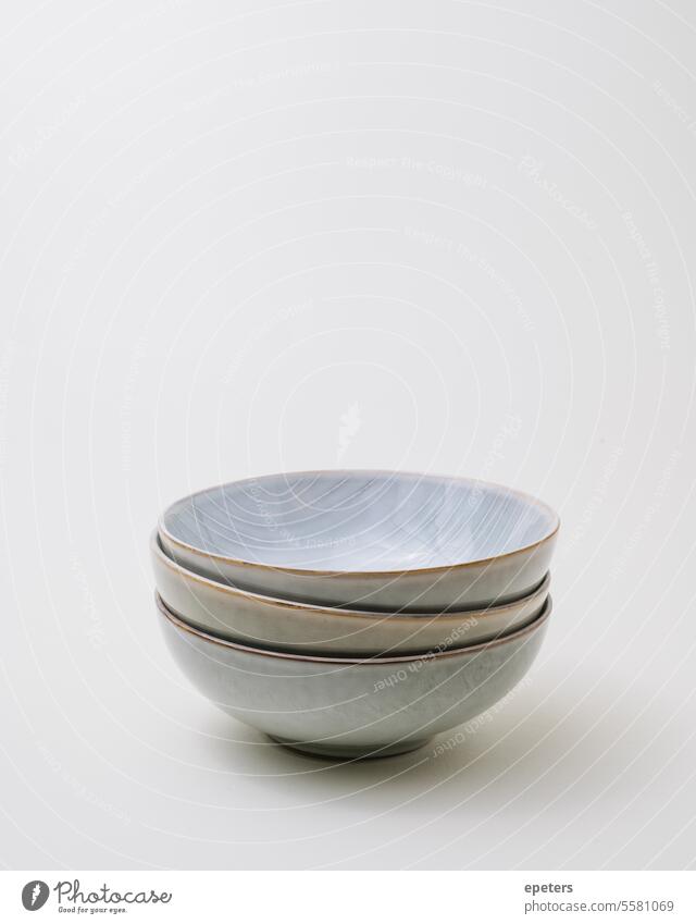 Stoneware ceramics on neutral beige background stoneware pottery handcrafted artisanal clay craftsmanship artistic handmade ceramic vessel stoneware bowl