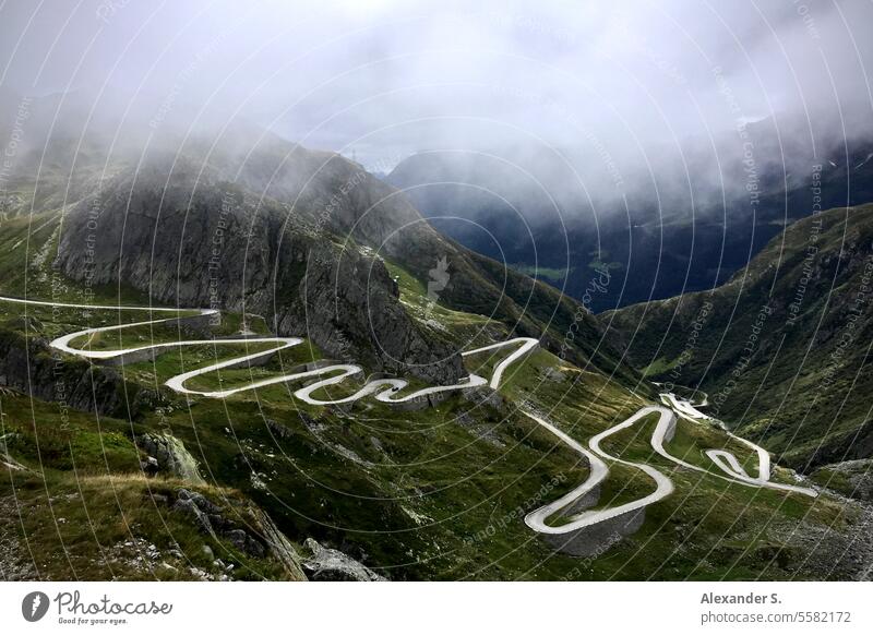 Serpentines of the old road over the Gotthard Pass in the Swiss Alps Gotthard pass Switzerland pass road Winding road Ticino mountain pass mountain panorama