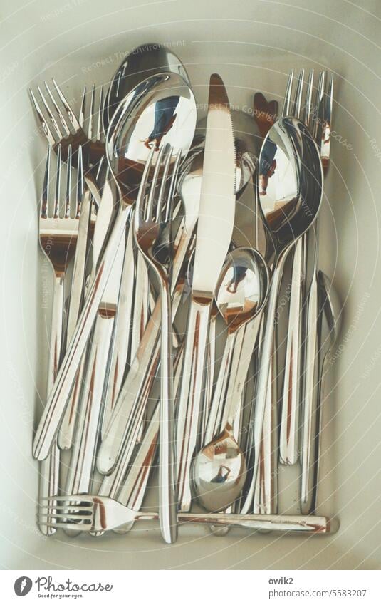tool kit Knives forks Cutlery Silverware box Metal Glittering reflection Kitchen utensils Close-up Insight Long shot New Spoon Tool hotchpotch