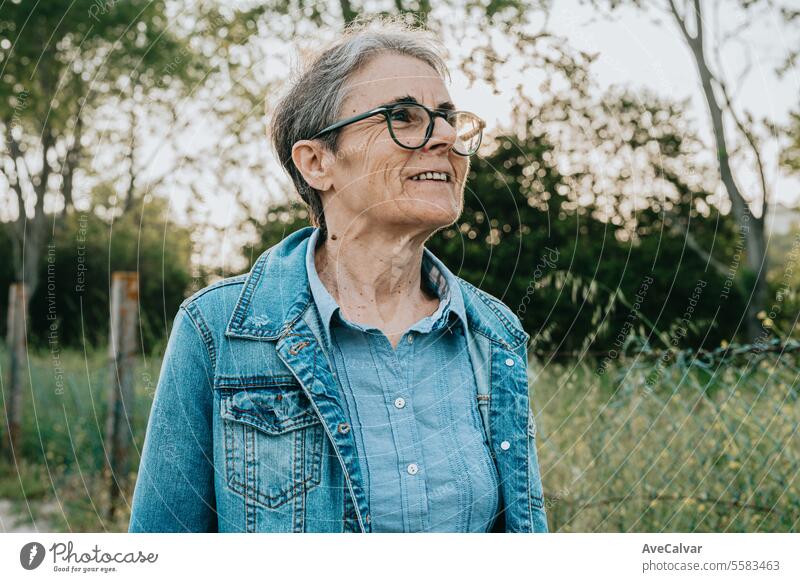 Senior smiling woman going on a trip after retiring, resting while looking at the magnificent sights mental retirement senior old elderly mature adult person
