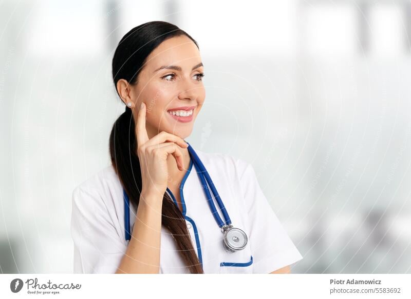 Portrait of a beautiful female doctor medical medicine clinic healthcare woman nurse stethoscope background physician smile pharmacist hospital surgeon team