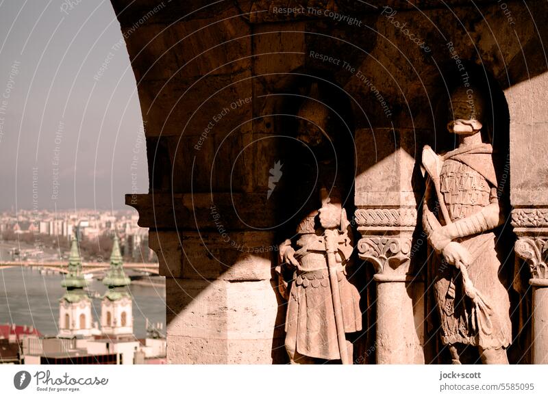 Statues of guardians between light and shadow Guard Budapest Historic Architecture Capital city Hungary Tourist Attraction Sightseeing City trip Danube