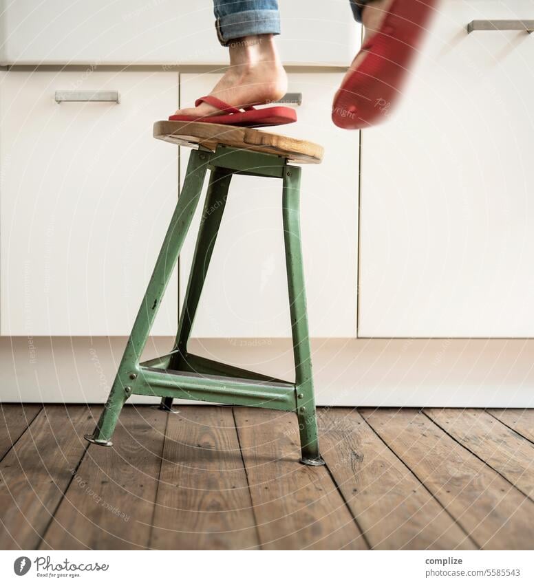 Person with flip-flops falls off stool | Dangers in the household Harm Flip-flops Ladder Ascending Interior shot Risk of accident Occupational health and safety