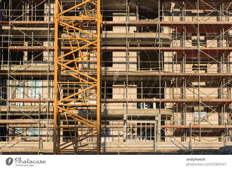 Scaffolding on a new building in shell construction architecture built cement concrete construction site contract credit design development engineering estate