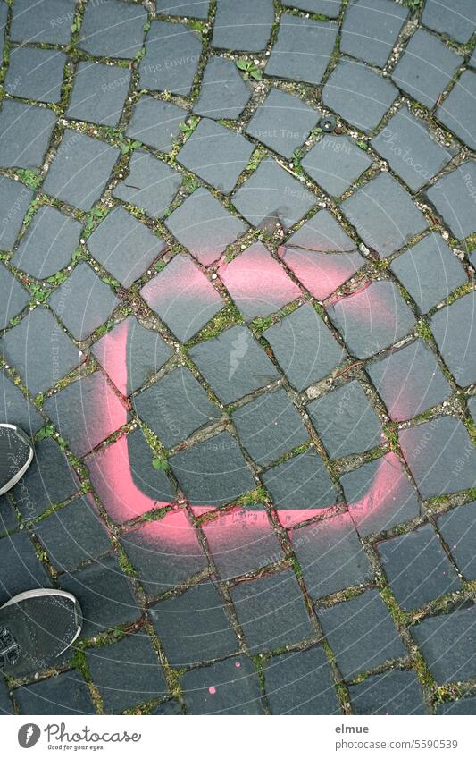 Edge of a square marked with pink / pink on pavement and shoe tips Pink Stencil paving spray marked position paved road Square Creativity Design Footwear