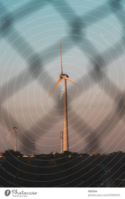 Wind power to boost sustainability and green energy in the Ghent, Belgium. Turning wind into energy windmill turbine renewable environmental electricity
