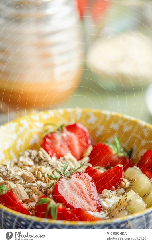 Close up of breakfast bowl with muesli and berries close up strawberry food meal healthy