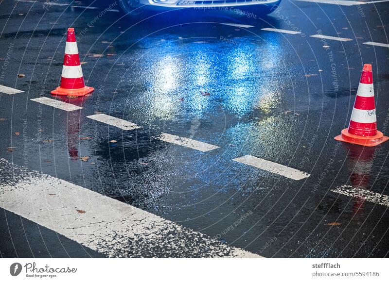 Wet road accident Police jump off wet road Street Rain Winter Autumn Transport Traffic infrastructure Accident Risk of accident Motoring car automobile