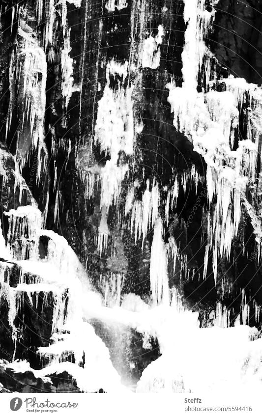 Gufufoss waterfall with ice and frost in Iceland Waterfall Icelandic frozen water icy cold ice formation Seydisfjördur Seyðisfjörður Seydisfjordur