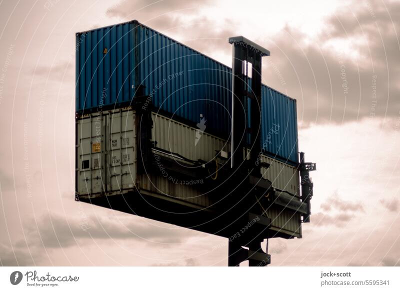 Container with lifting system Logistics Lifting system Trade Economy Container cargo Sky Clouds Sunlight Shadow Back-light Technology Worm's-eye view Crane