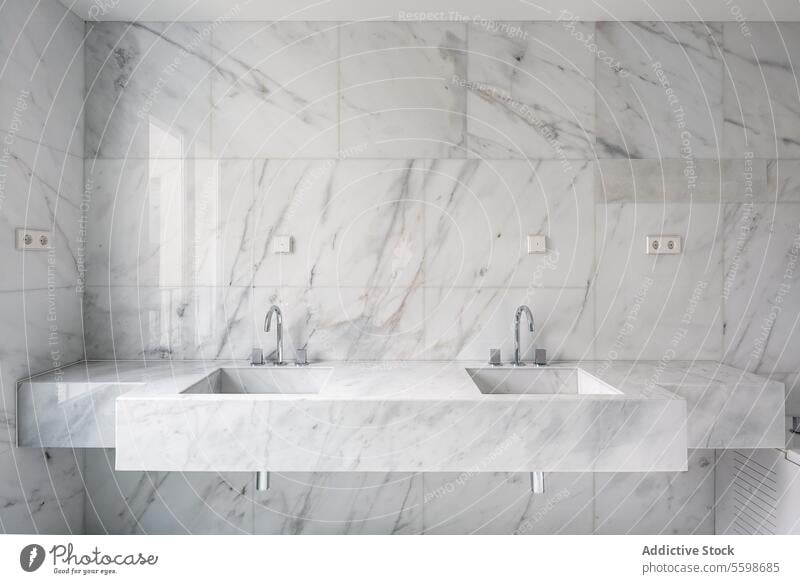Double marble sinks in white tiled bathroom penthouse faucet modern washbasin tap double stainless steel wall design minimal style apartment interior hygiene