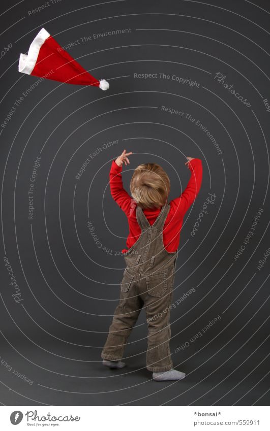 Merry Christmas Playing Christmas & Advent Child Toddler Boy (child) Infancy 1 Human being 1 - 3 years Cap Santa Claus hat Flying Throw Happiness Small Wild Joy